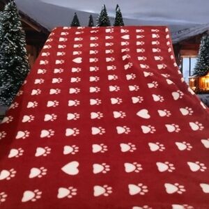 Doggie blanket a red & white with prints on it soft & cozy. 77”x50” clea…